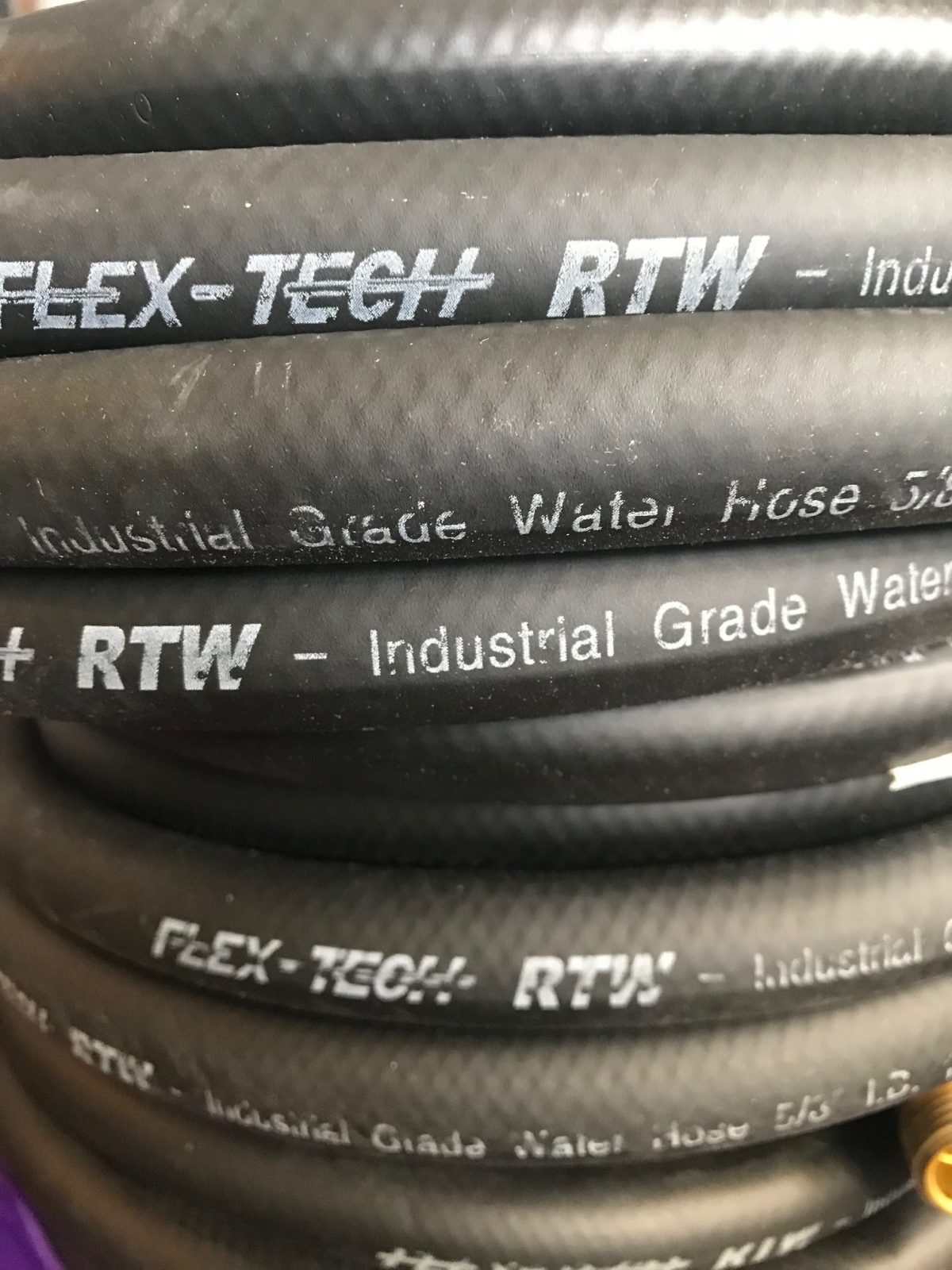 Black 5/8 inch x 25 foot industrial grade wash down water hose with brass fittings